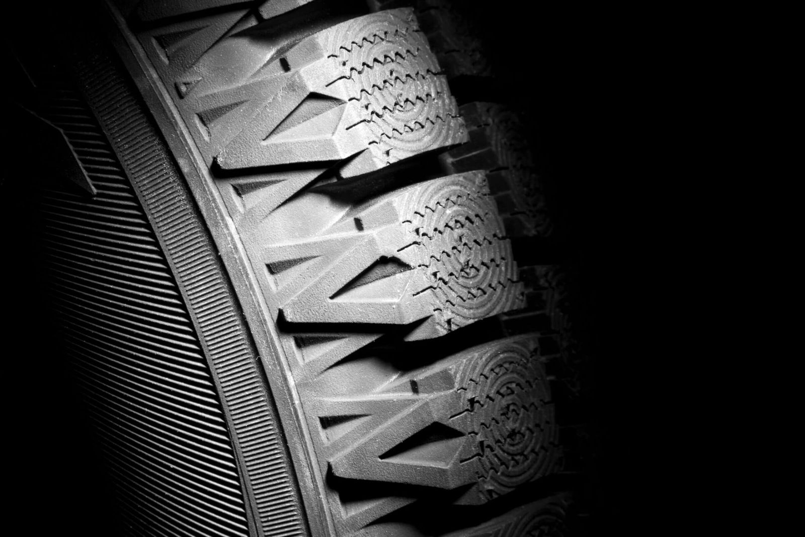 Close-up of a new winter tire containing the code that is engraved: the DOT