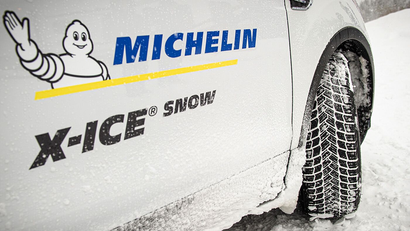View of Michelin truck and new Michelin X-Ice Snow tire on the road