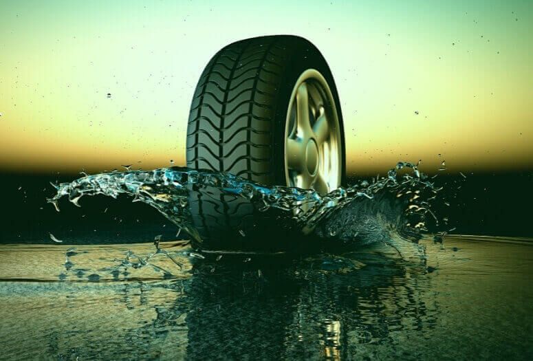 Summer tire in water showing its resistance to hydroplaning